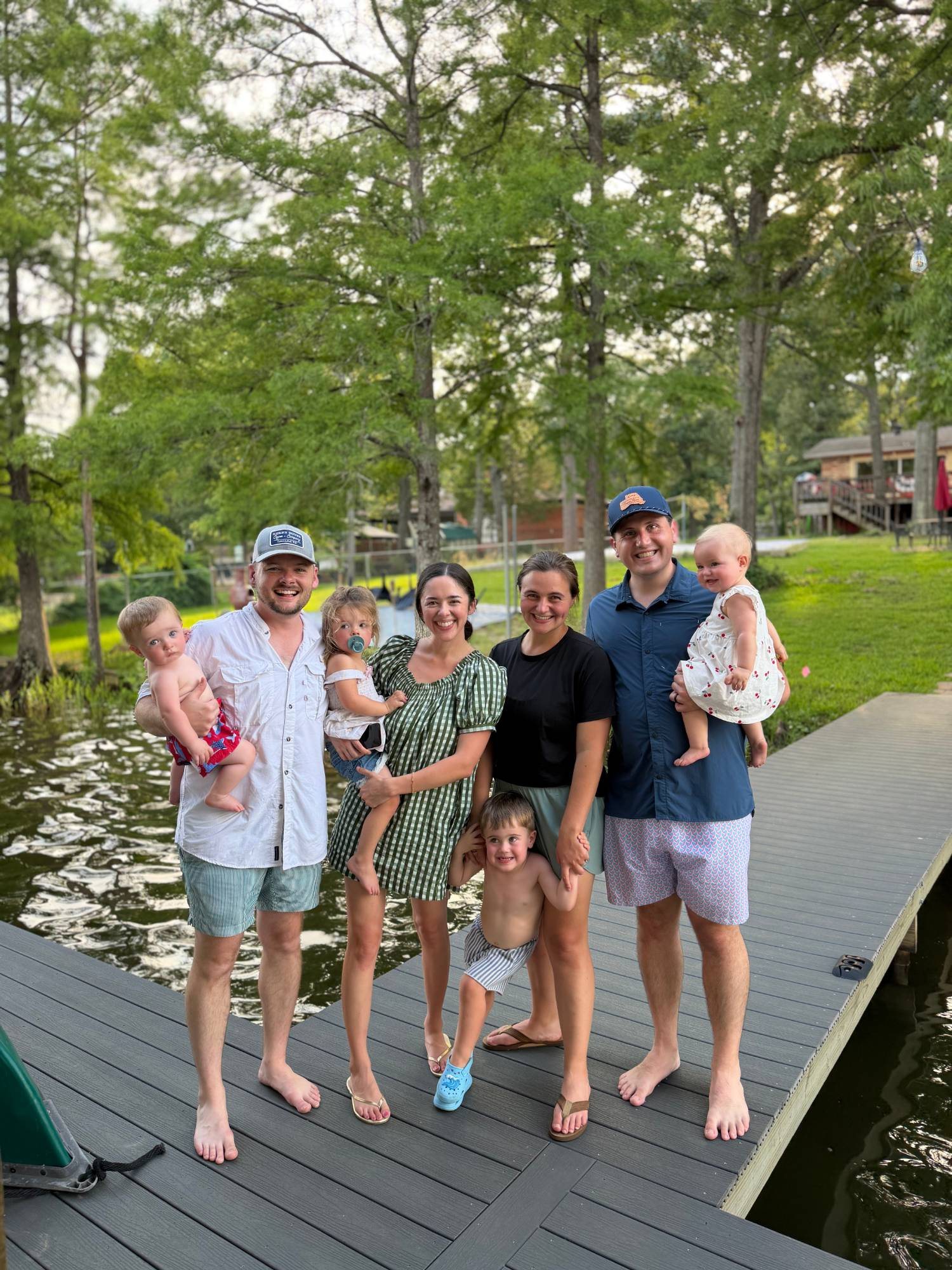 The Yeager and Jayroe families together on a lake dock